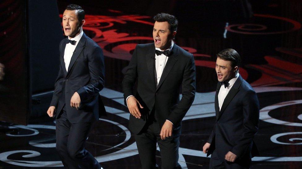 Joseph Gordon-Levitt, Seth MacFarlane and Daniel Radcliffe sing on stage at the Oscars