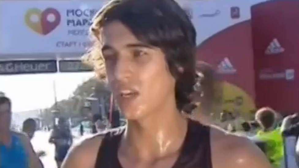 Rinas Akhmadeyev speaking to Moscow 24 at the finish line