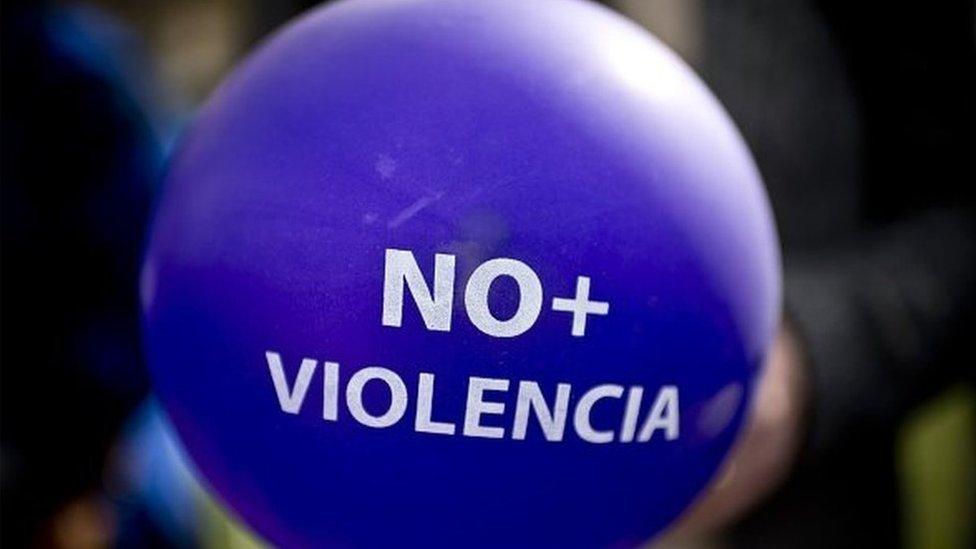 A balloon reading 'No More Violence' can be seen at a demonstration in front of the La Moneda presidential palace in Santiago on June 3, 2015.