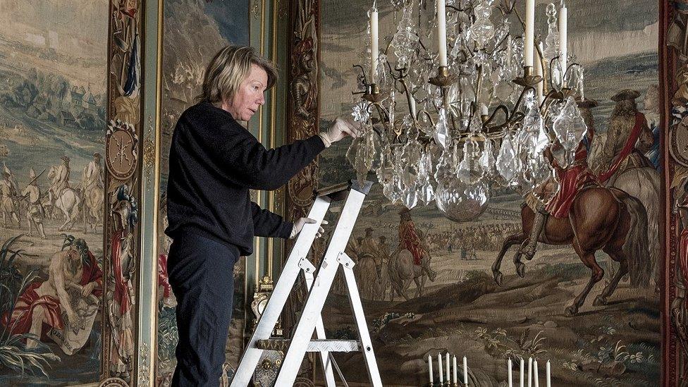 Cleaning a chandelier in 2016