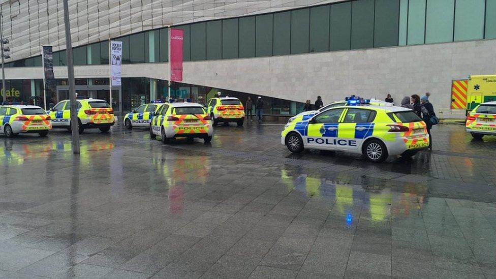 police cars outside the museum