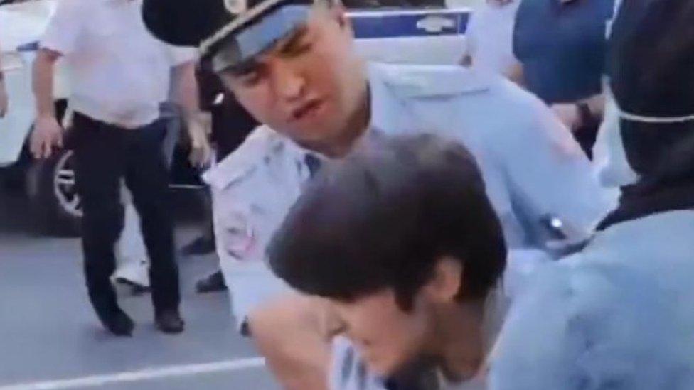 A protester is arrested in Dagestan