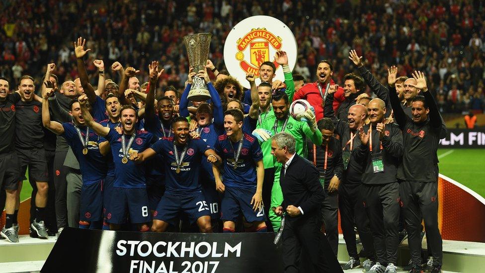 Manchester United with Europa League trophy