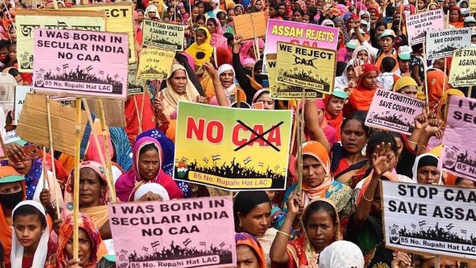 Demonstrators attend a protest against the new citizenship law in Rupahi town of Assam.