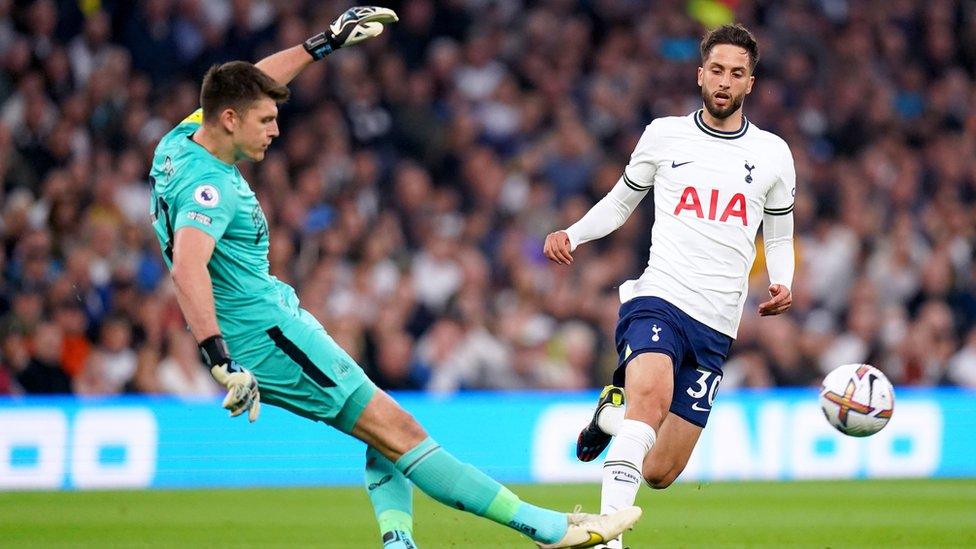 Newcastle United goalkeeper Nick Pope clears the ball away from Tottenham Hotspur"s Rodrigo Bentancur during the Premier League match at The Tottenham Hotspur Stadium, London