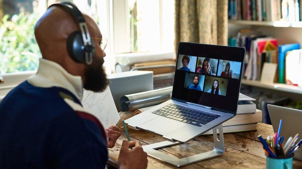 Man on Zoom meeting at home