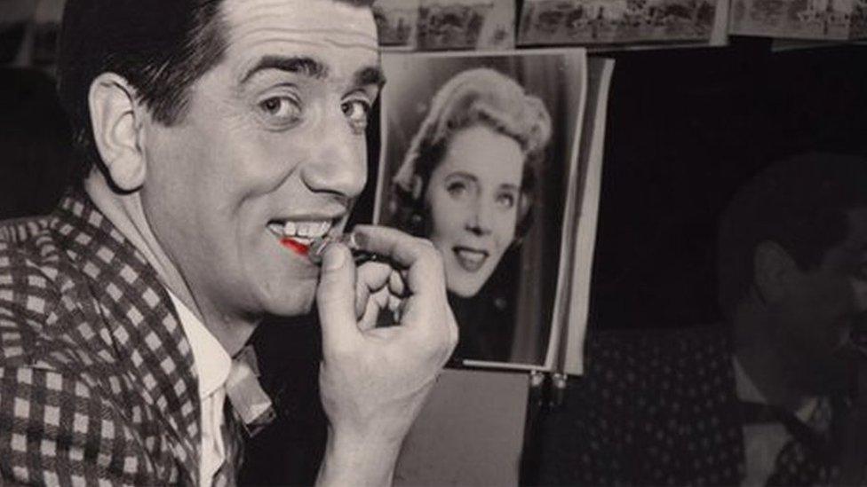 A young Johnny Beattie photographed backstage in his dressing room in a 1950s variety theatre show.