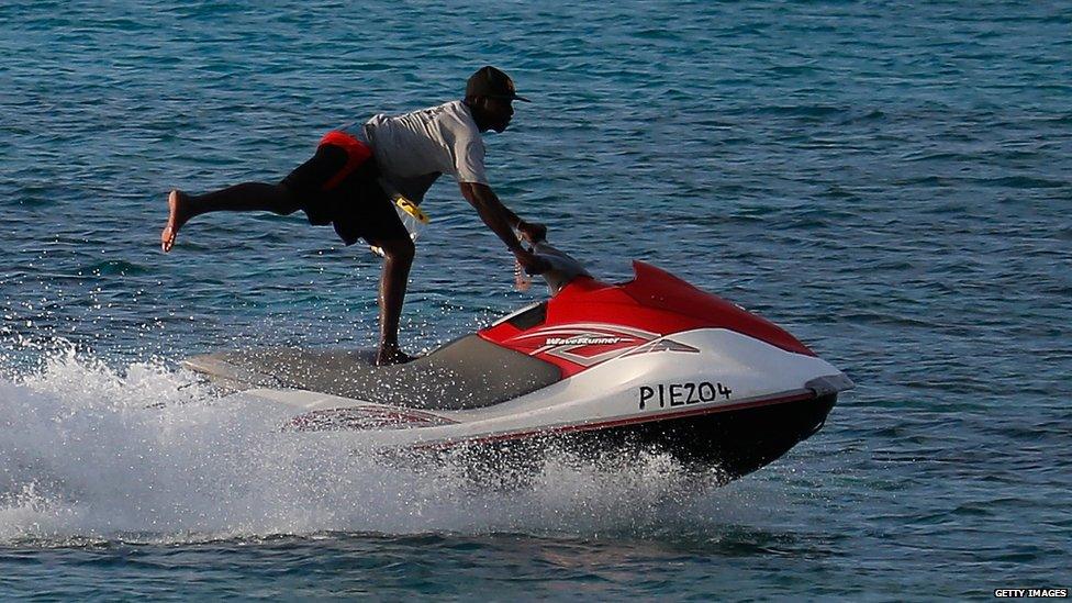 a man jetskiing