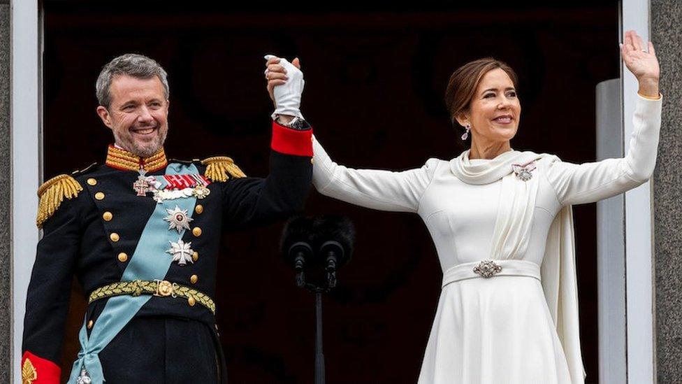 King Frederik and Queen Mary wave to the crowds following the coronation