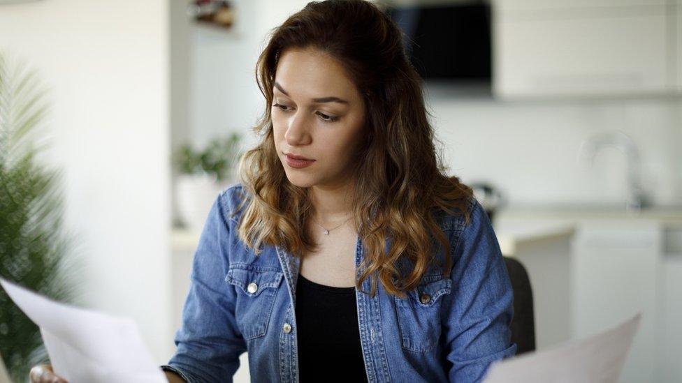 Woman reading a letter