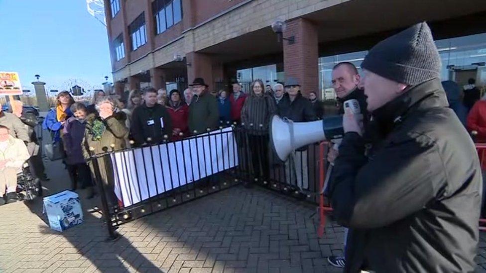 Protestors outside the public inquiry