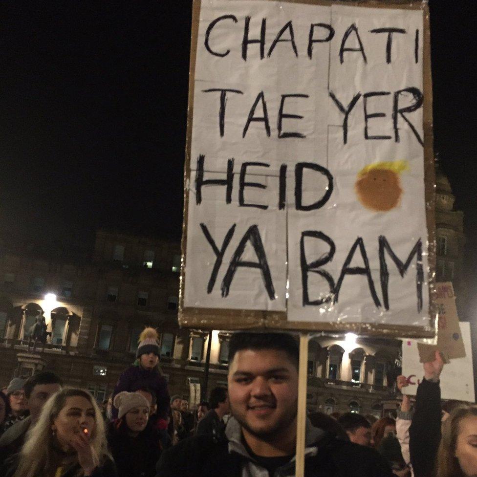 The BBC's Lorna Gordon saw this sign at the Glasgow protest