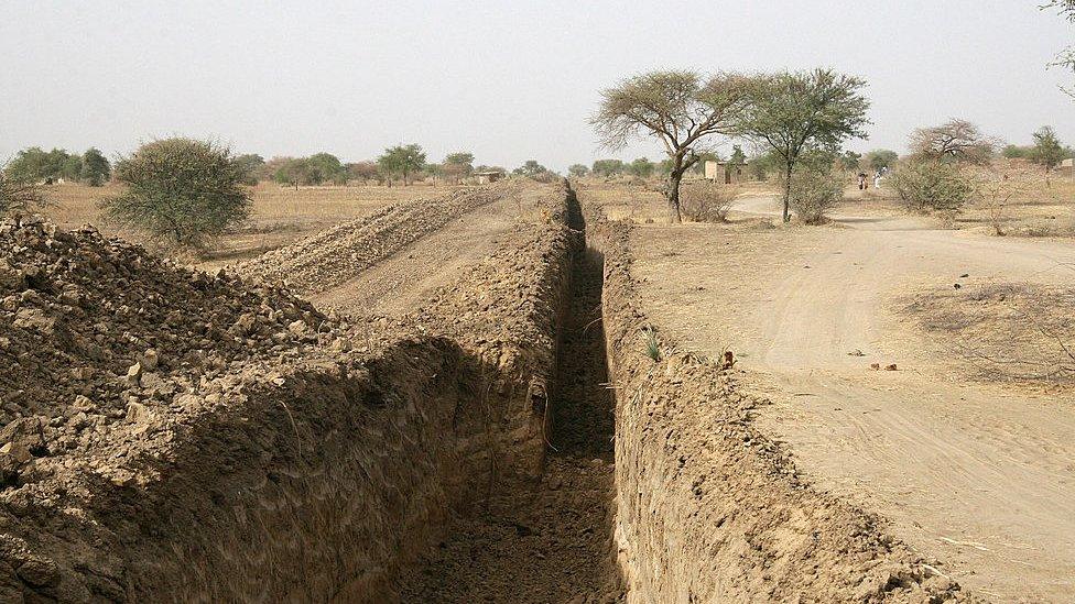 A picture taken on March 16, 2008 shows part of a 3-m deep trench dug by Chad's government around the capital N'Djamena to prevent attacks from rebels based in the east of the country