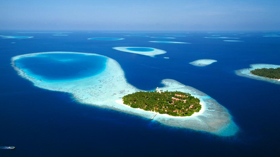 Aerial view of atolls in the Maldives, Indian Ocean