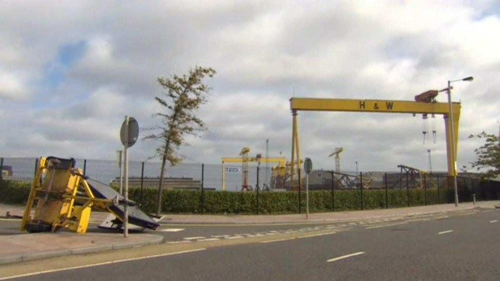 A road sign toppled near Harland and Wolff but Belfast's giants Samson and Goliath stood firm