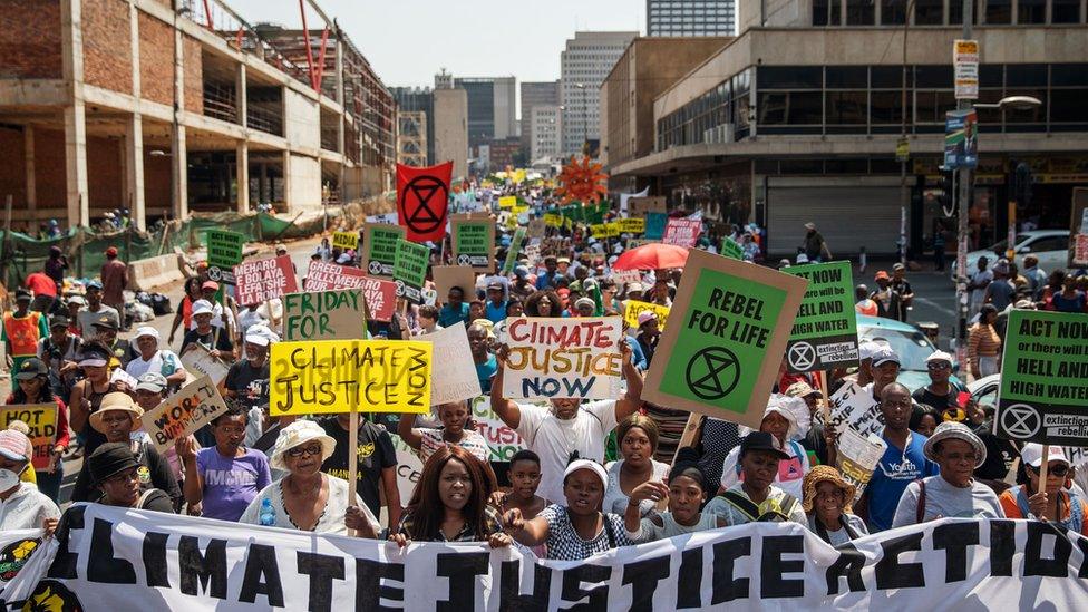 Protesters rally against climate change as part of a Global Climate action day in Johannesburg in South Africa - 20 September 2019