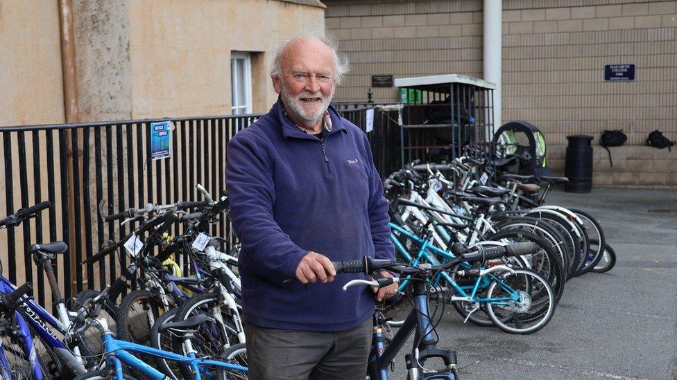 Allister Carey MBE with bikes