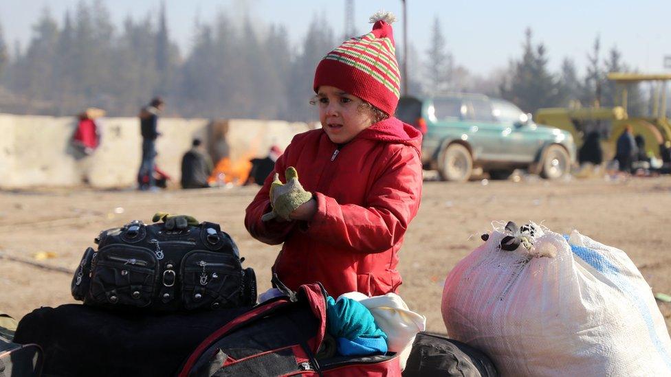 Syrians evacuated from the last rebel-held pockets of Syria's northern city of Aleppo, on December 19