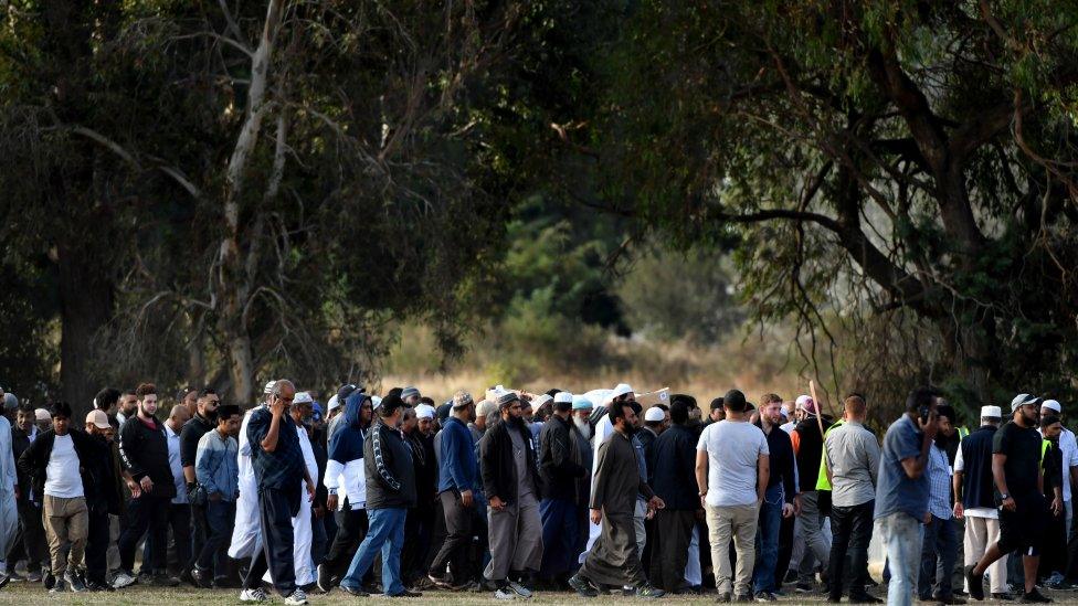 Mourners carry the casket of a 58-year-old man during the fifth funeral for the 50 victims of the mosque shootings at the Memorial Park Cemetery in Christchurch, New Zealand, 20 March 2019