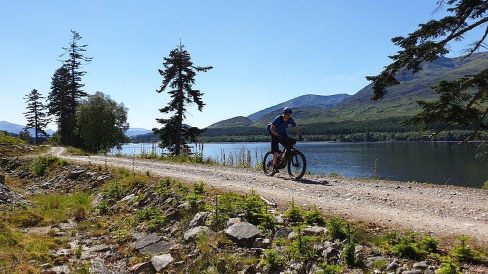 A cyclist on the Great North Trail in Loch Lomond and the Trossachs National Park