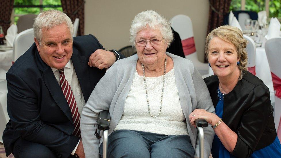 Kevin Hughes and his mother June Margaret Hughes with a woman