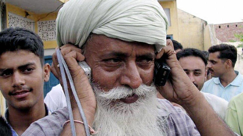 A farmer on the phone in India