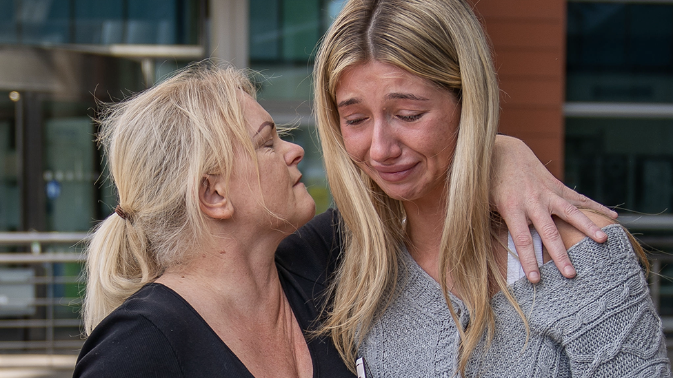 Hollie Dance (left) with Ella Carter outside the Royal London hospital