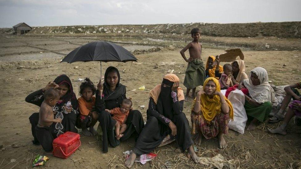 Rohingya refugees resting after crossing into Bangladesh