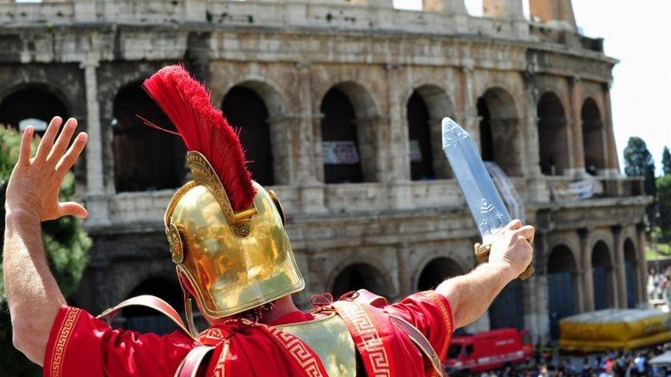 A man dressed as a Roman Centurion at the Colosseum, 2012