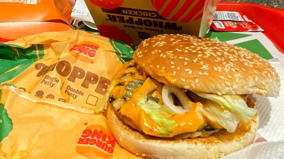 A sandwich without the usual slices of tomatoes is pictured at a Burger King outlet in New Delhi on August 17, 2023. Soaring vegetable prices after a bad harvest have prompted Burger King's Indian outlets to take tomatoes off their menu items, following in the footsteps of other fast food giants. (Photo by Arun SANKAR / AFP) (Photo by ARUN SANKAR/AFP via Getty Images)