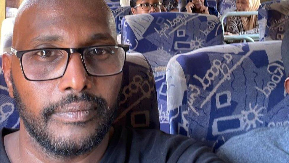 Amar Osman and his family on a bus in Sudan