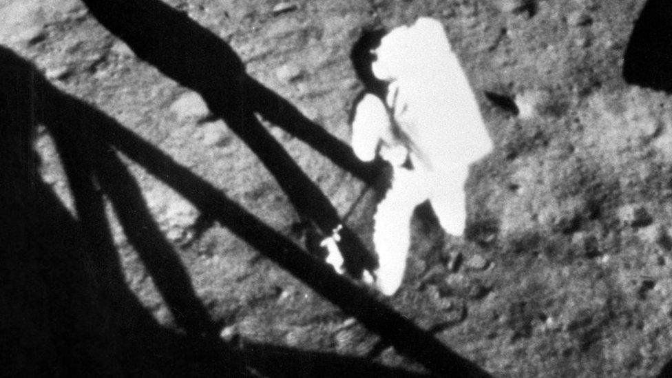 Neil Armstrong becomes the first person to set foot on the moon