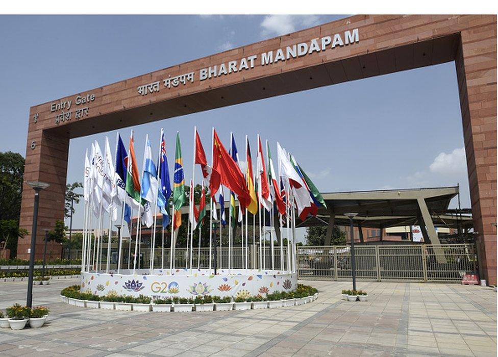 The flags of participating countries wave outside the Bharat Mandapam at ITPO Convention Centre ahead of the G20 India Summit in New Delhi, India on September 1, 2023.