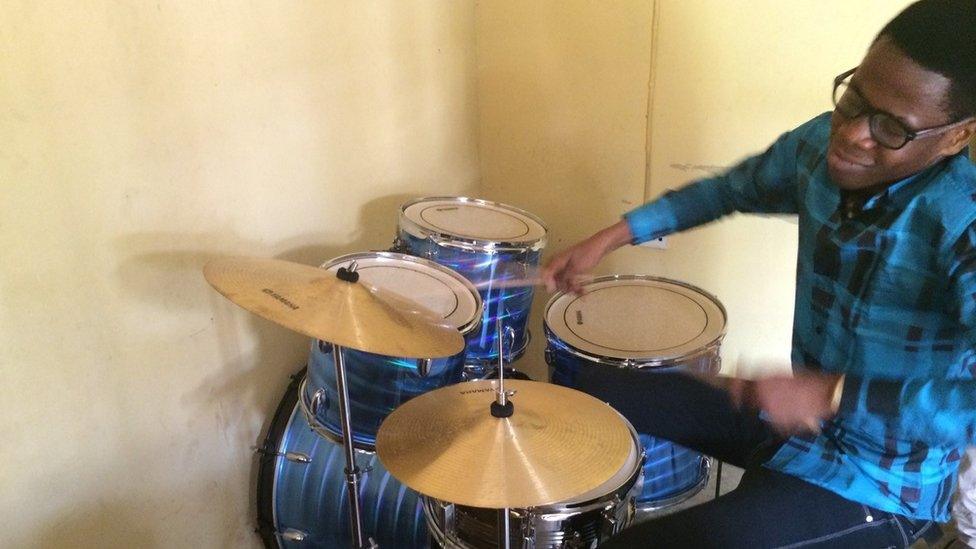 Drummer practises at Peter King Music College, Lagos