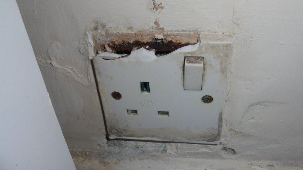 A corroded plug socket