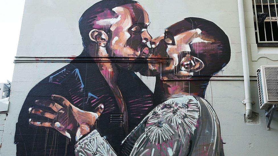 The mural depicting Kanye West kissing himself