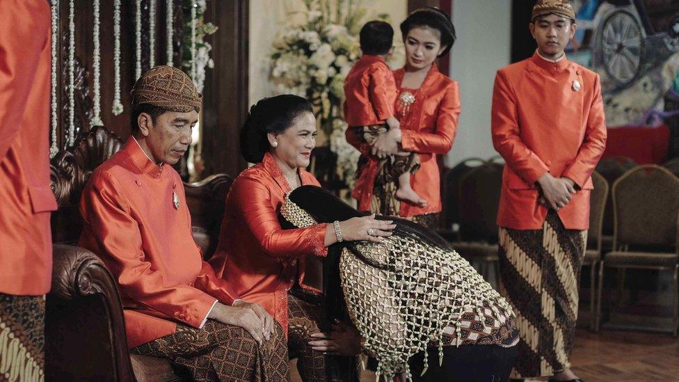 Indonesian President Joko Widodo with his daughter and wife