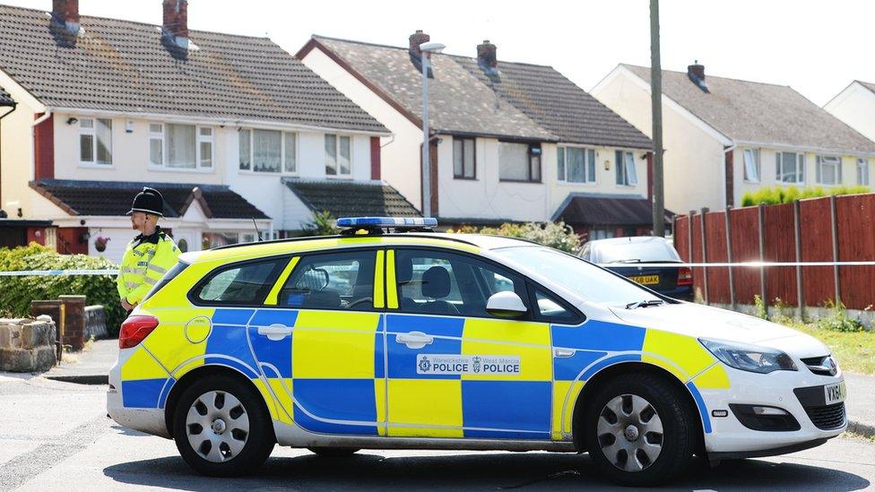 Police officer and car in Meadow Close