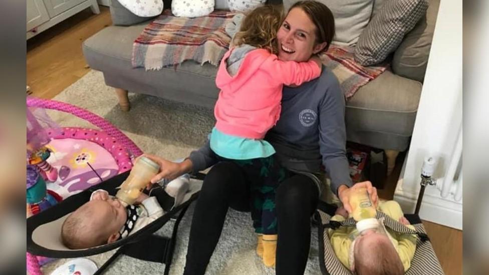 Emily Courtney with her children