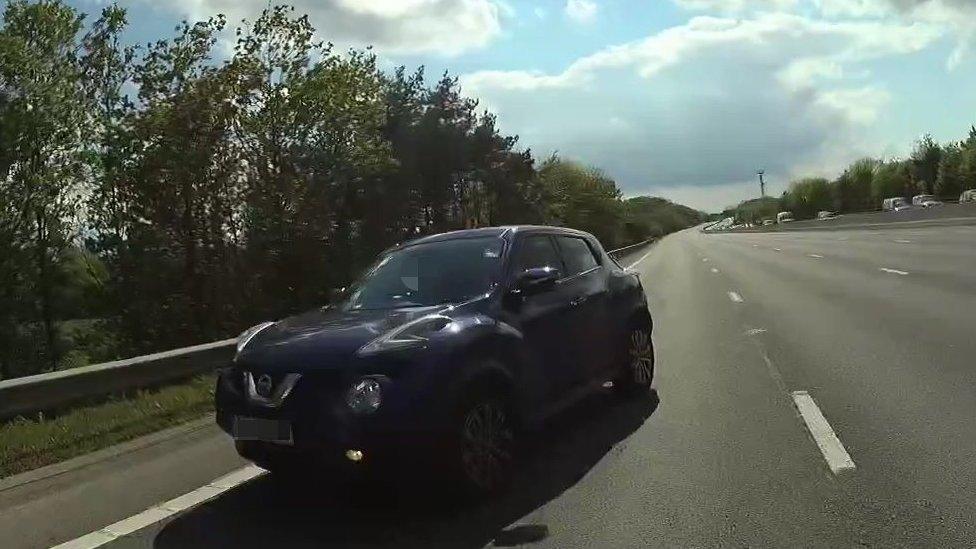 A car going the wrong way on the M25