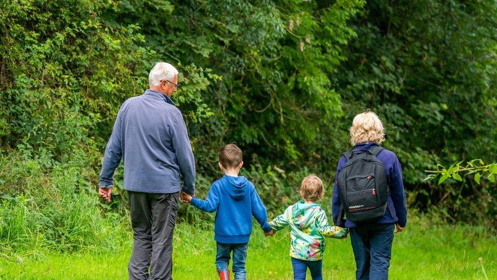 A family in some woods