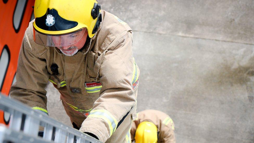 Firefighter on a ladder