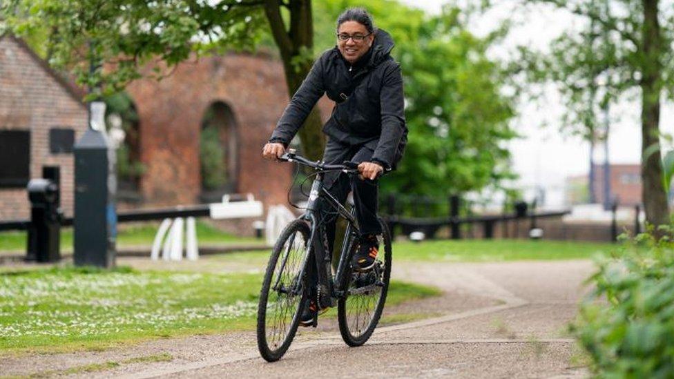 Man riding e-bike