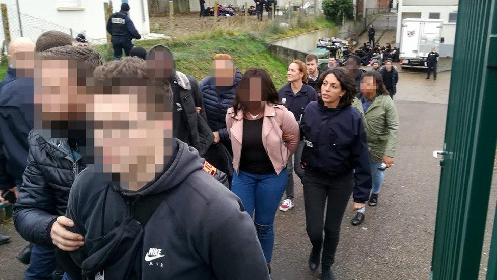 Police arrest students close to the Saint-Exupery high school in Mantes-la-Jolie in the Yvelines, following clashes in which 146 people were arrested on December 6, 2018