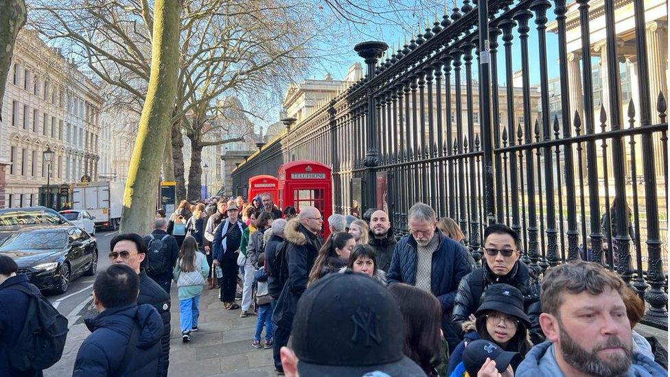 Queue of visitors outside the entrance to the British Museum