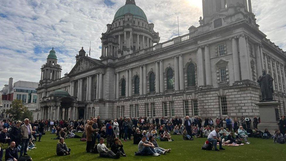 Crowds of people gathered at Belfast City Hall to watch the Queen's funeral on a big screen