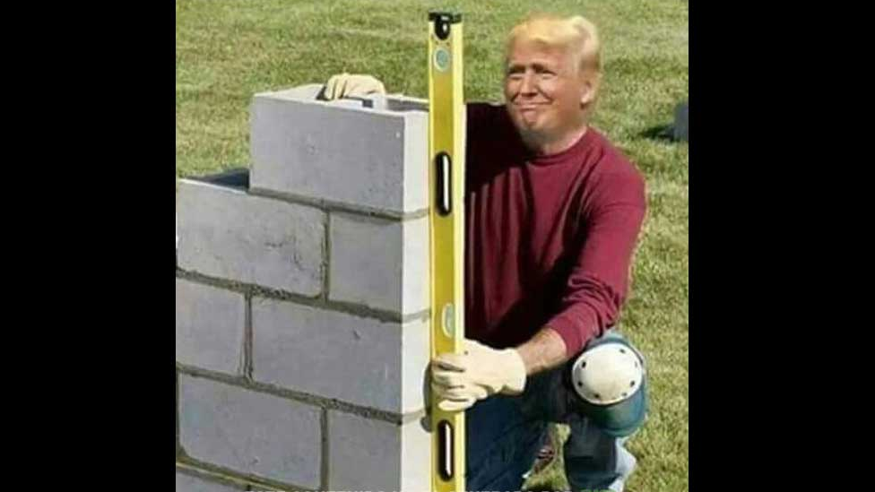 Photoshopped image of Donald Trump building a wall