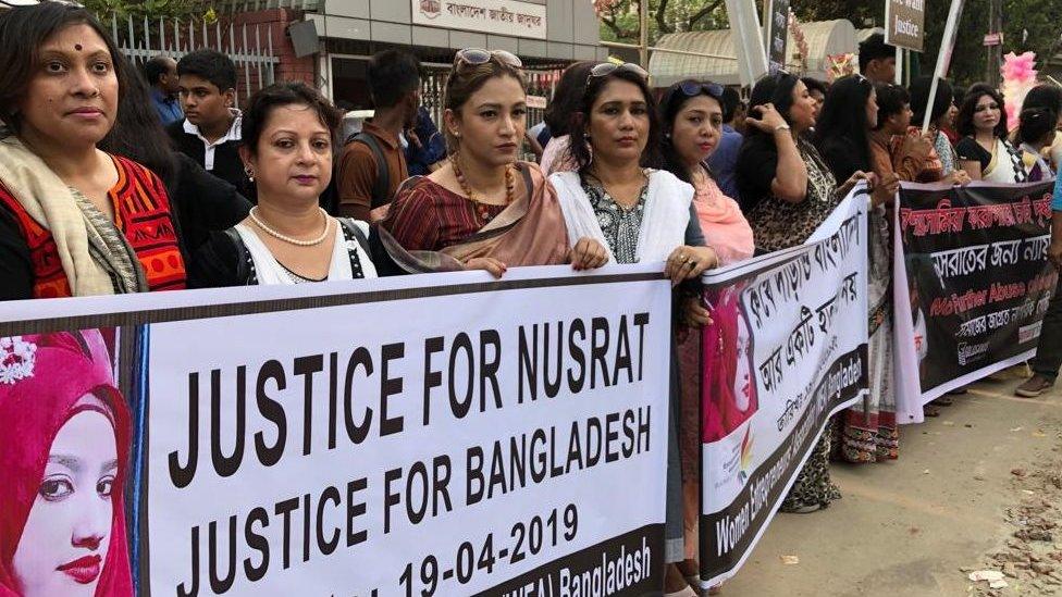 Women protesting outside the court on Thursday