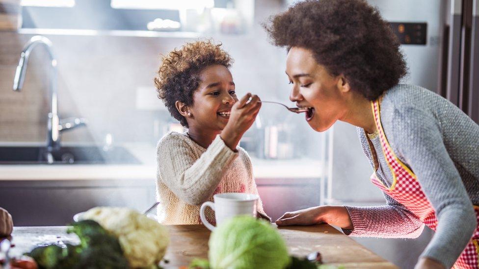 Mum-and-child-cook-vegetables.