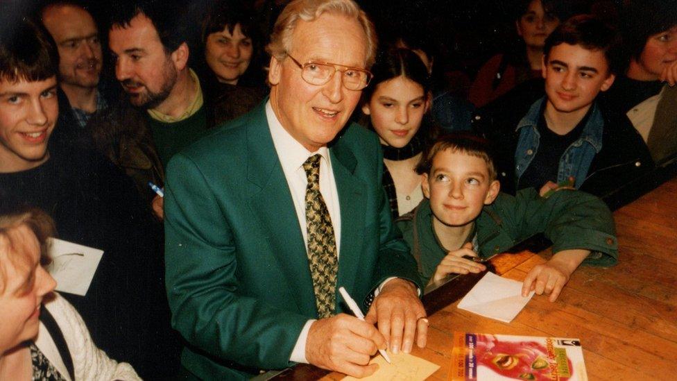 Game show host Nicholas Parsons pictured signing autographs at the festival in 1997